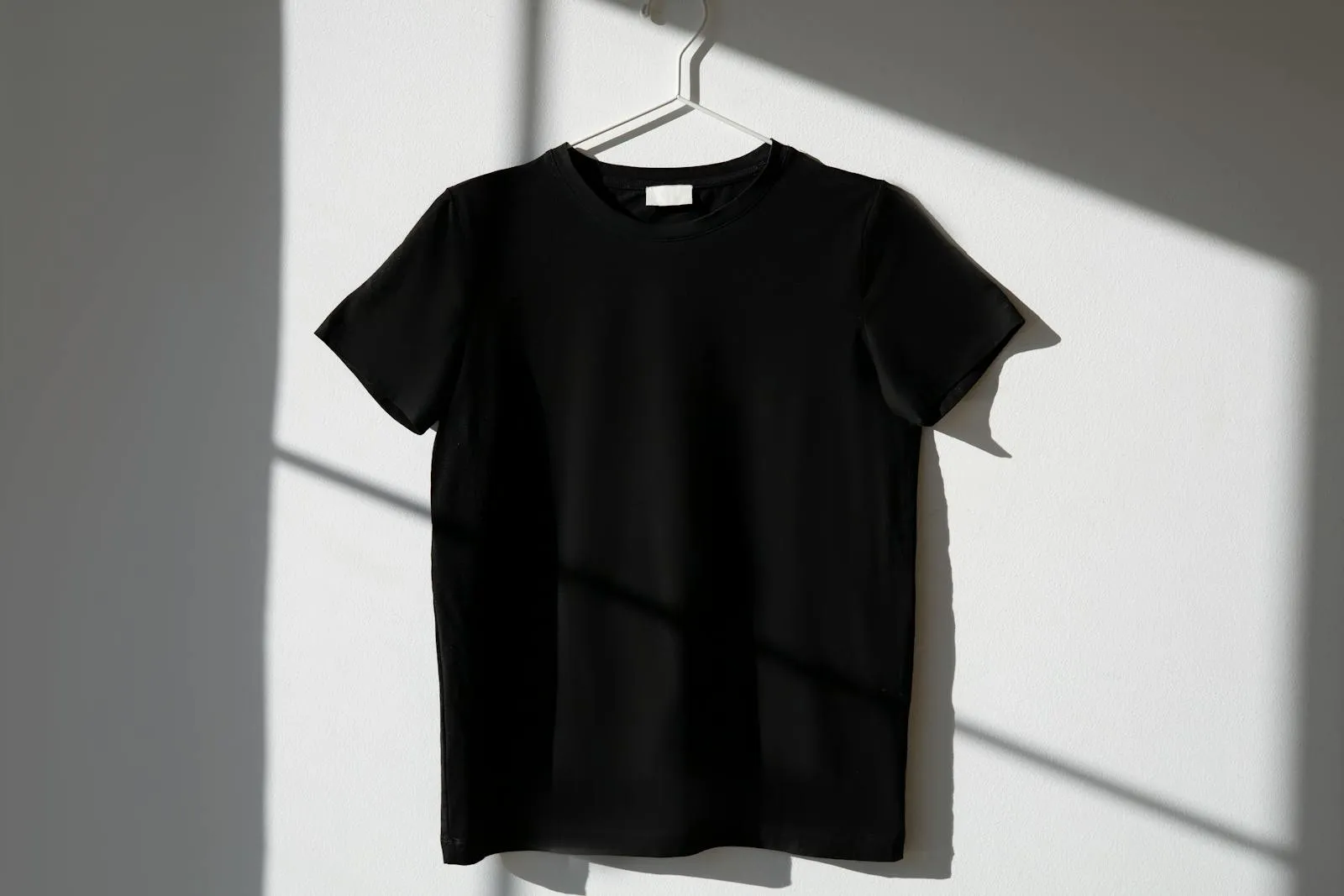 Plain t-shirt on a hanger